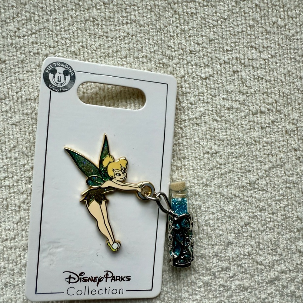 2 Disney items-Tinker Bell Pin with Blue Potion vial and Mickey Mouse earrings